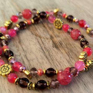 nieuw!! 2 armbanden roze tinten