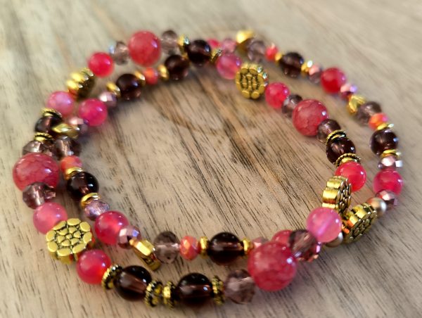nieuw!! 2 armbanden roze tinten